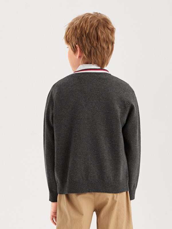 كارديجان للأولاد من شي إن، بأزرار أمامية ونقشة مخططة