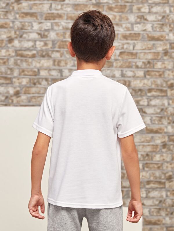 قميص بولو للأولاد من شي إن بنقشة بيزلي 