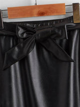 SHEIN Girls Laser Cut Out Belted PU Skirt
