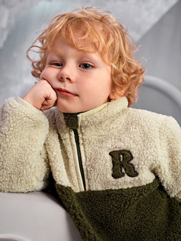 سويت شيرت للأولاد الصغار من شى ان  بسحاب أمامي مطرز بحروف 