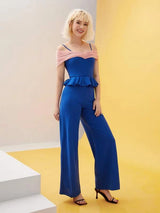 جمبسوت من شي إن بتفصيلة مجمّعة وحافة مكشكشة