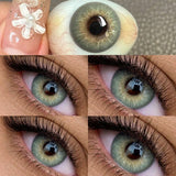 Close-up of a green eye with detailed view of iris and pupil.