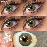 Close-up of eyes with contact lenses, showing a detailed view of the lenses and eye.