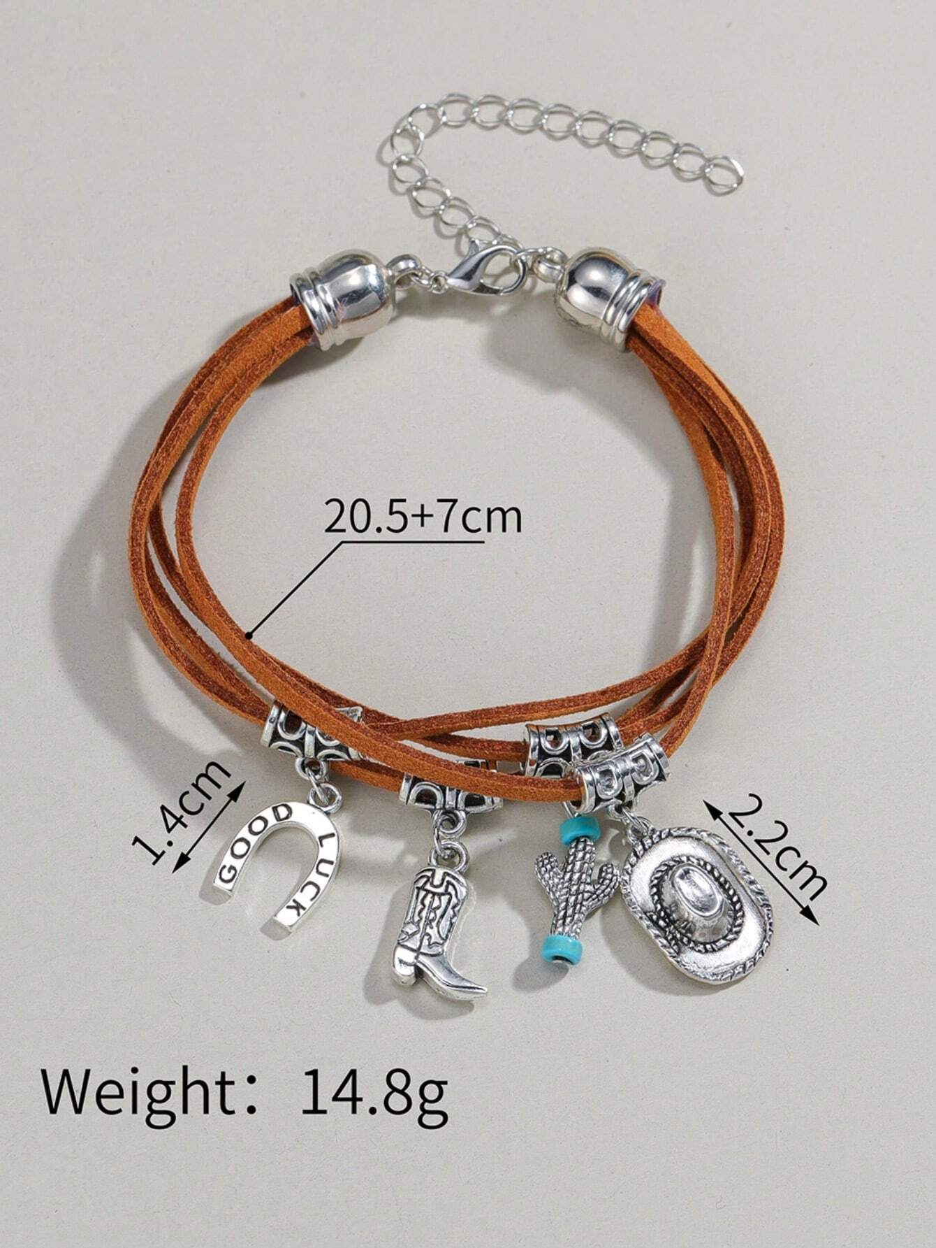 Bracelet with charms and measurements on a gray background