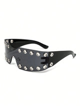 Black sunglasses with silver studs on a white background