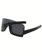 Black sunglasses with wide lenses on a white background