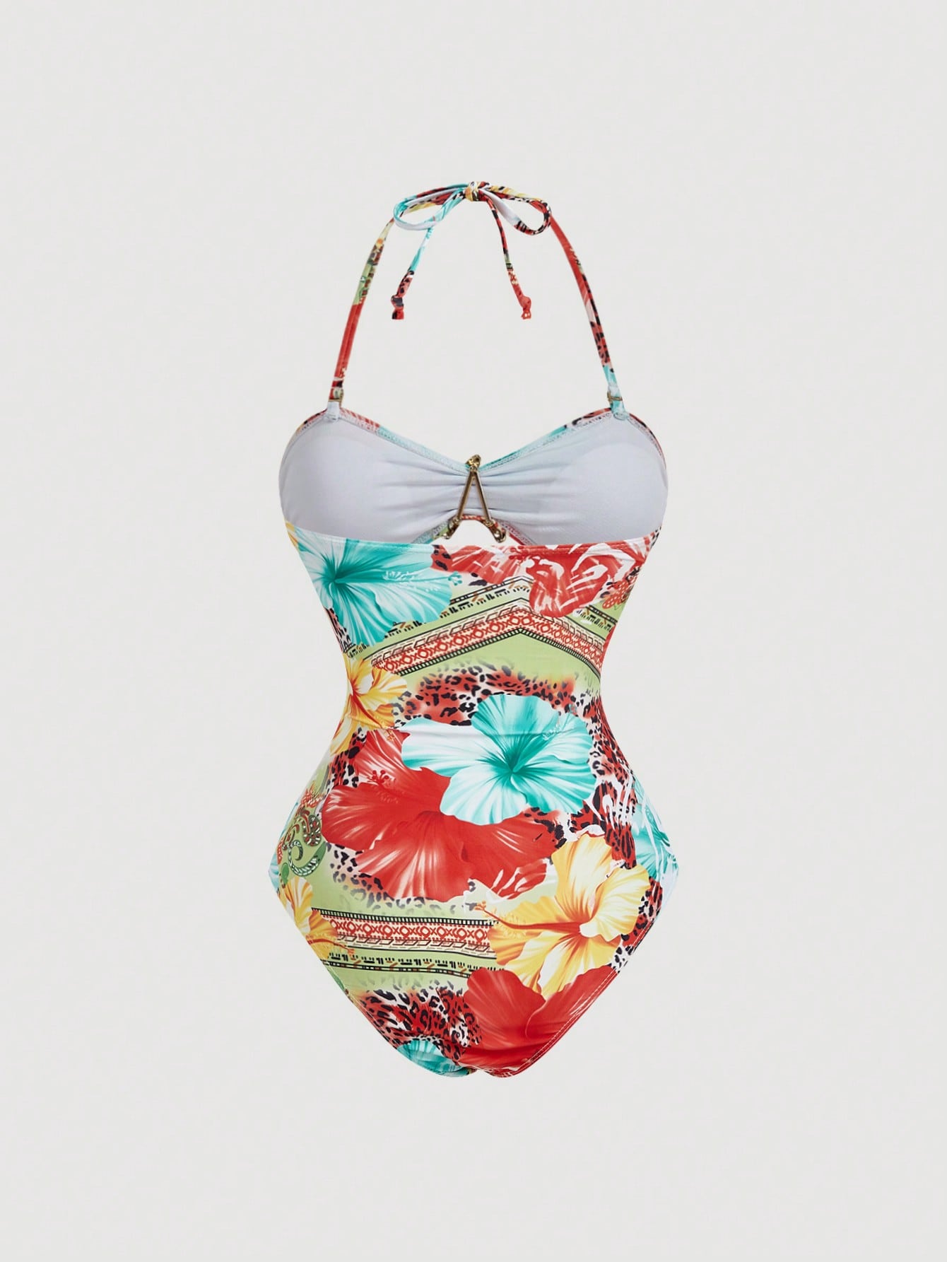 Colorful floral-patterned swimsuit on a light gray background