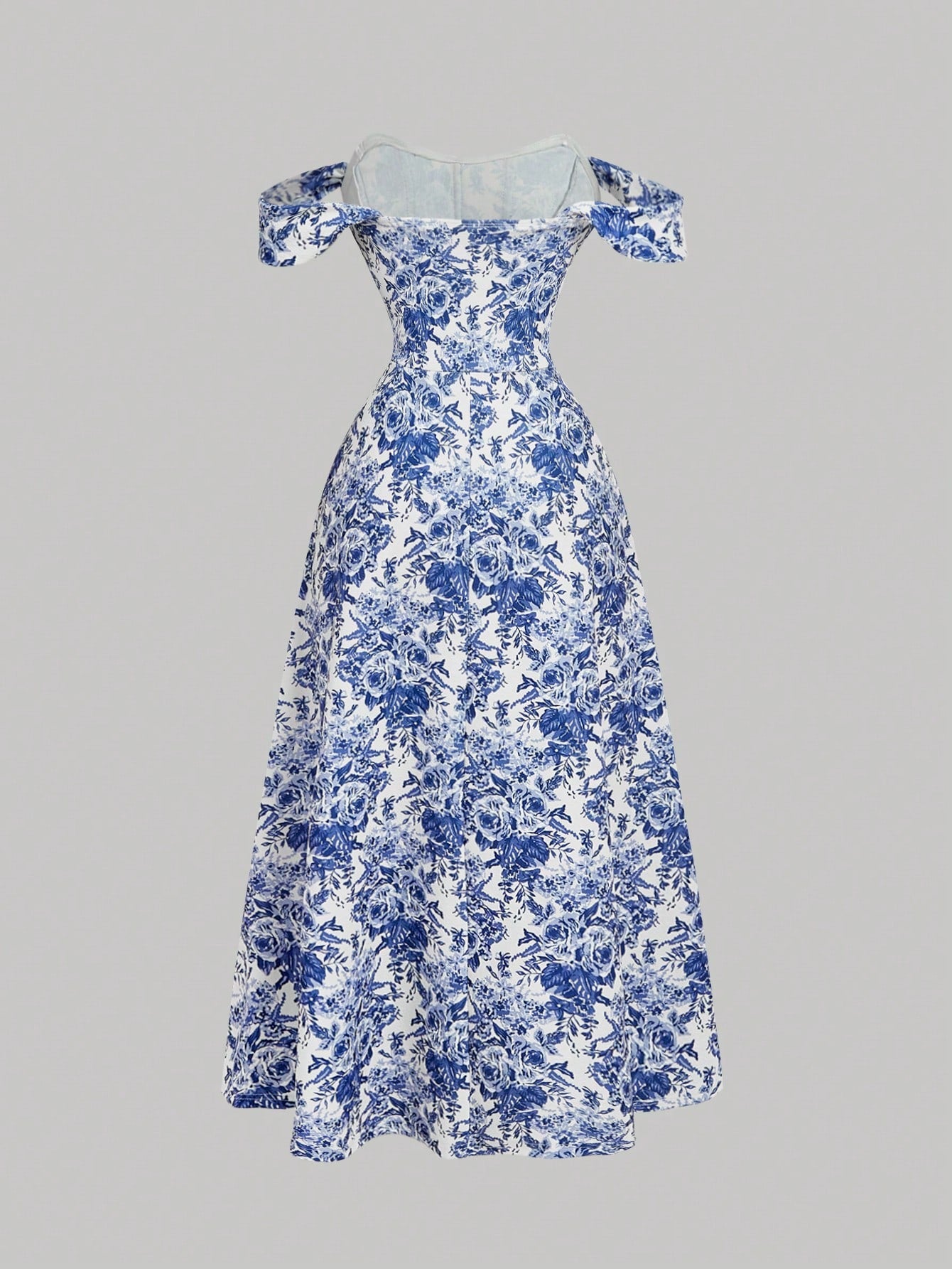 Blue and white floral dress on a gray background