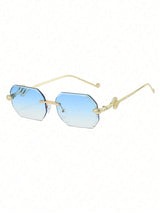 Sunglasses with gold frame and blue gradient lenses on a white background