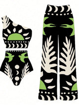 Set of black, green, and white patterned leggings on a white background