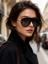 Woman wearing sunglasses on a city street