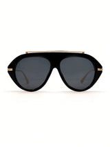 Black sunglasses with gold accents on a white background