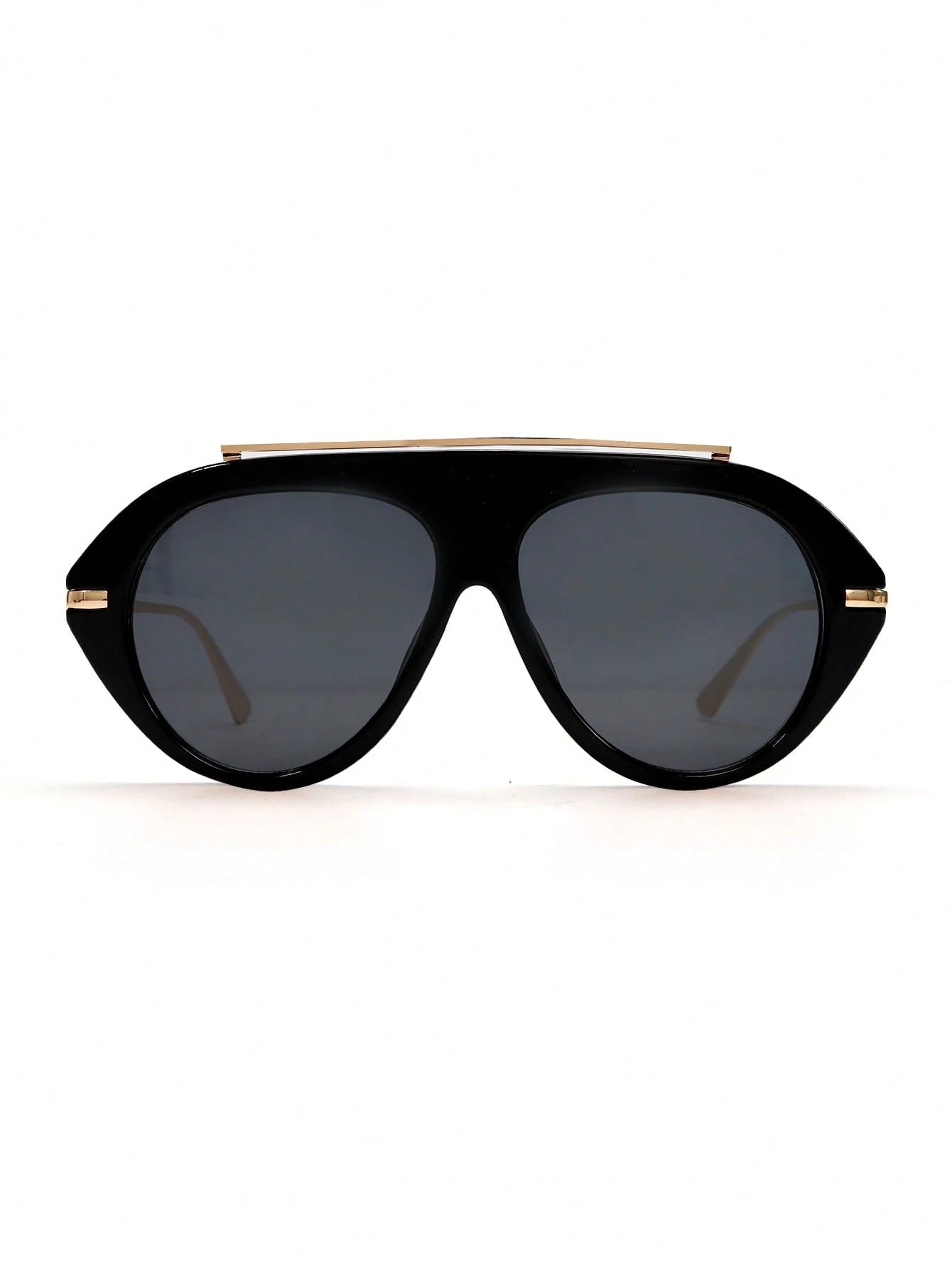 Black sunglasses with gold accents on a white background