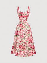Floral dress with pink straps on a light gray background
