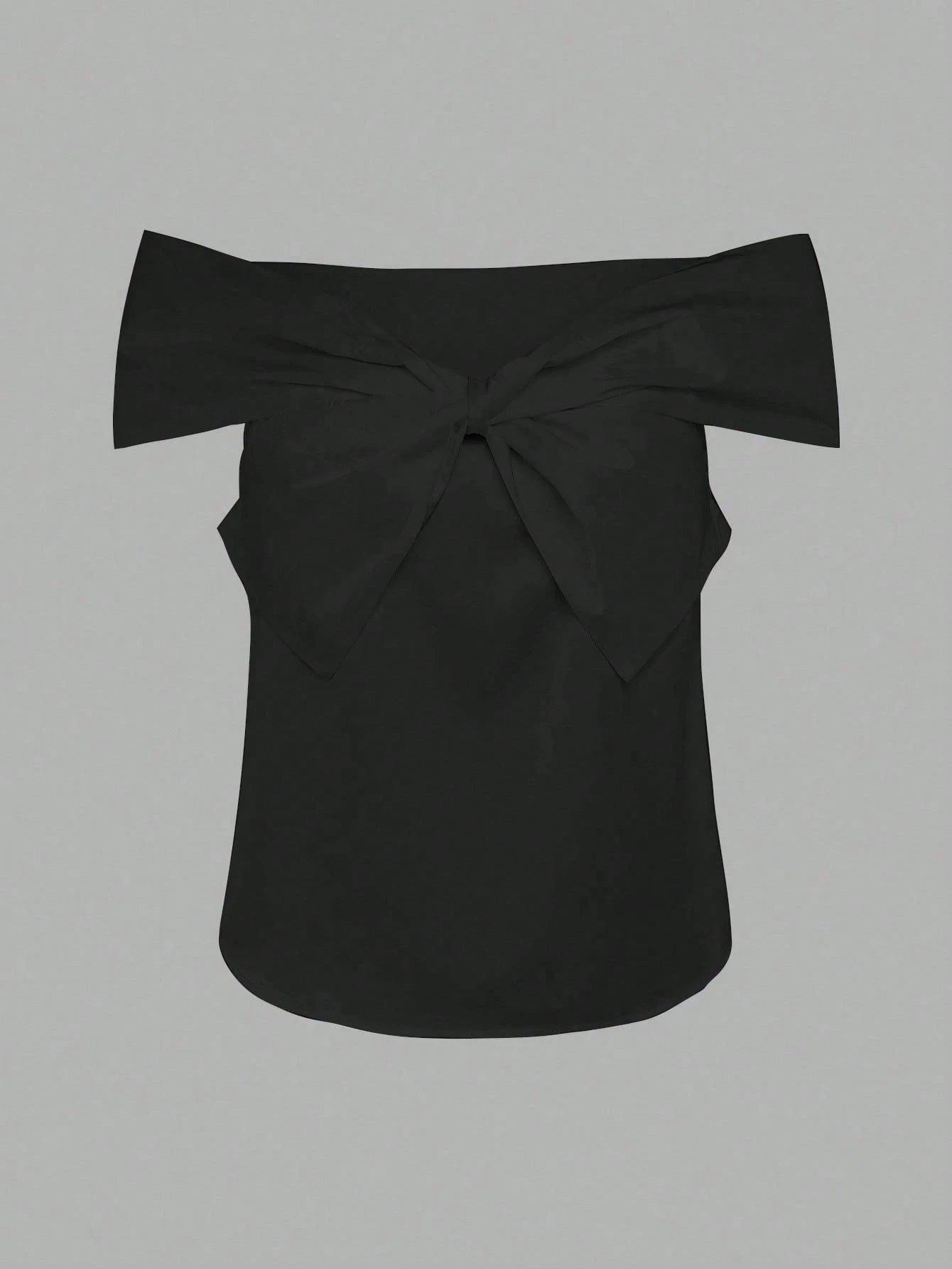 Black off-shoulder top with a bow detail on a gray background
