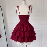 Red dress on a mannequin against a white background