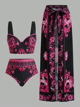 Black and pink patterned bikini set with matching pants on a gray background