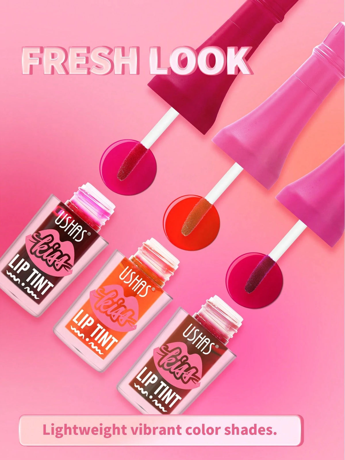 Three Ushbis 'Let's Lip Tint' bottles with applicators on a pink background, showcasing three different vibrant lip tint colors: dark berry, coral orange, and deep red. The text 'FRESH LOOK' is displayed at the top, and 'Lightweight vibrant color shades.