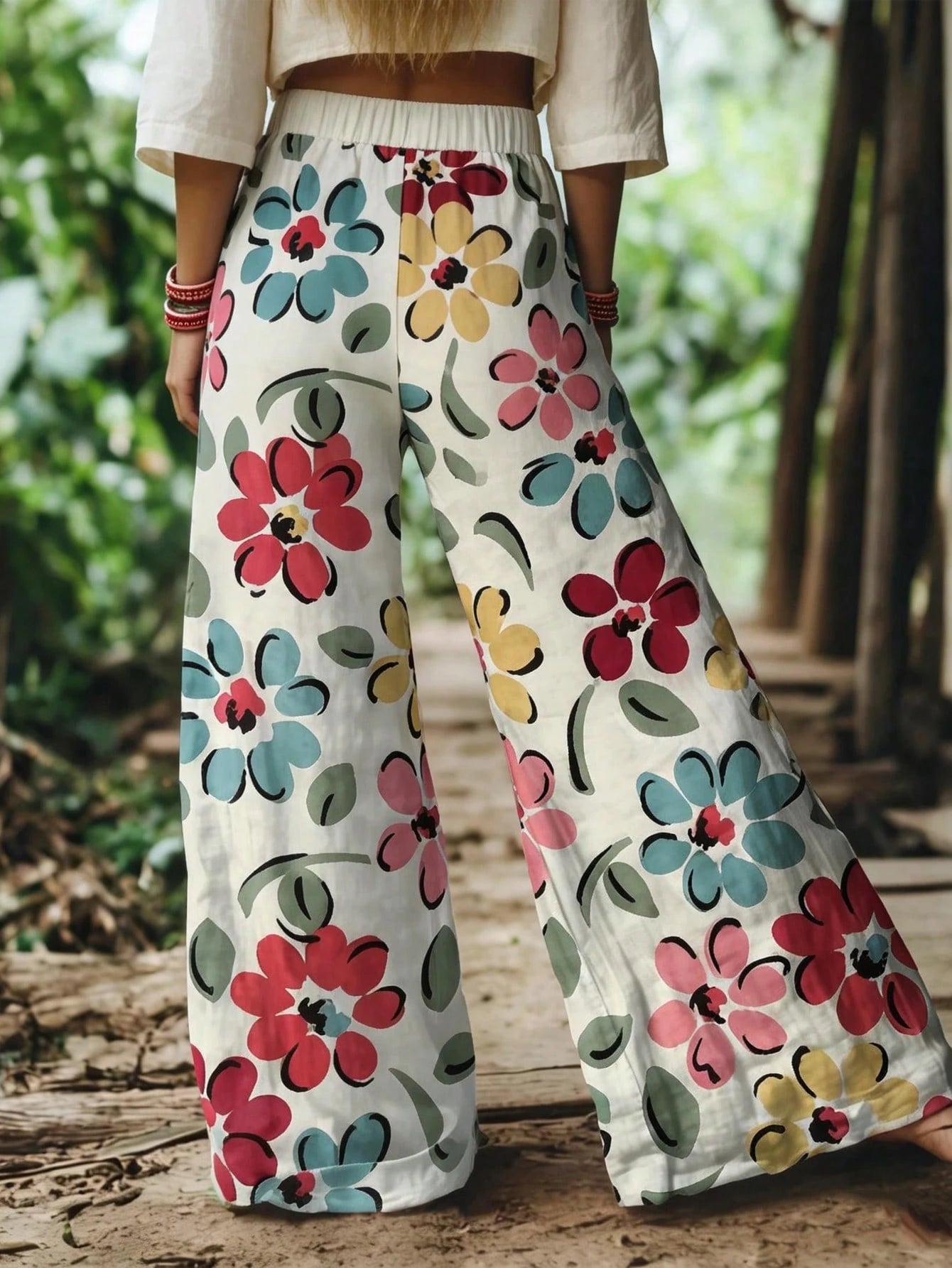 Floral-patterned pants worn by a person in a natural setting