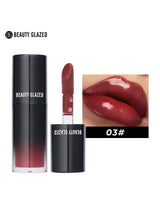 Beauty Glazed lipstick with packaging and color swatch on a white background