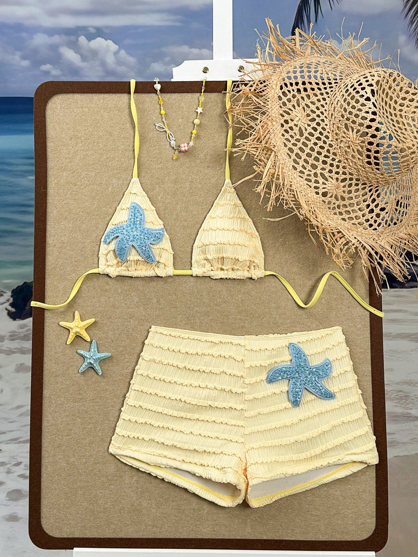 SHEIN Swim SXY Summer طقم سباحة نسائي قطعتين، بنطلون شاطئ بخصر وربطة عنق بحمالة عنق وديكور نجم البحر بلون أصفر خردلي من قماش جديد مزخرف