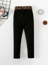 شى ان بنطلون ضيق بنقشة جلد النمر متباينة اللون عند الخصر 